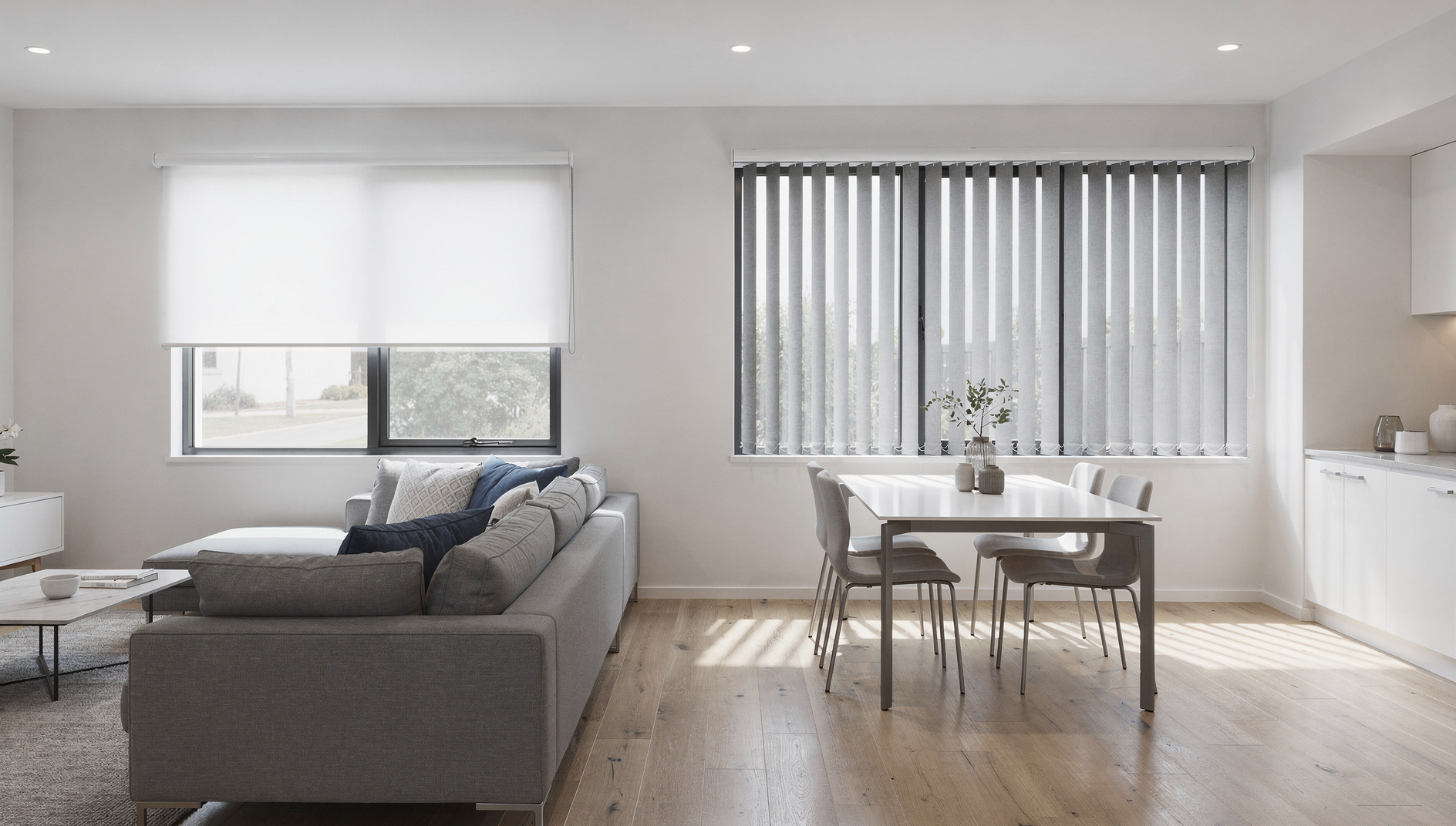 Open-plan living and dining room with custom roller blinds and vertical blinds on different windows