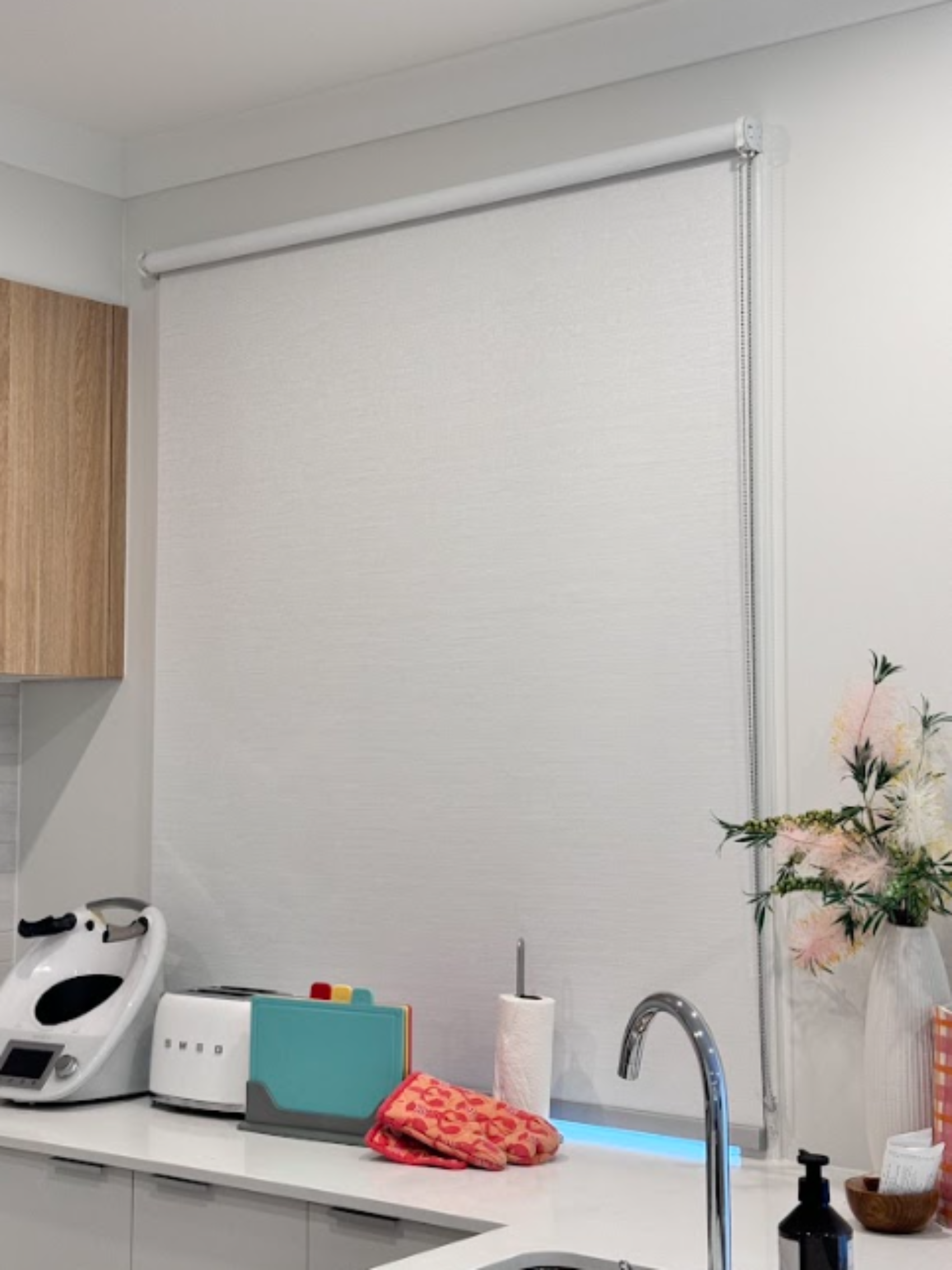 White blockout roller blind for kitchen window
