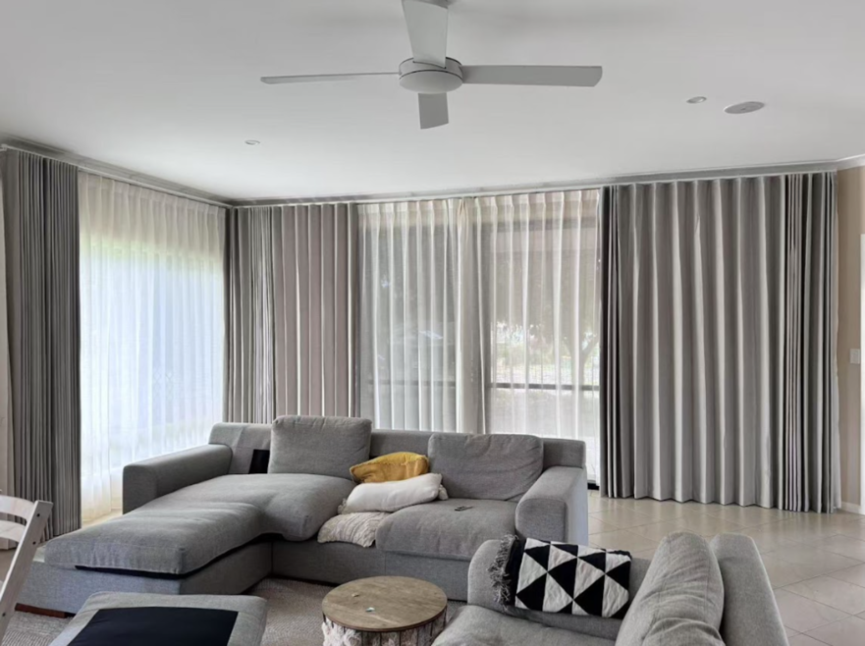 S-fold curtain with pinch sheer in living