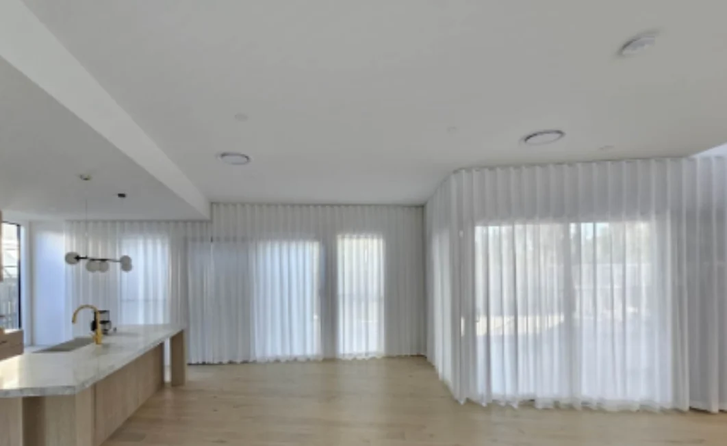 S-fold transparent sheer installed for sliding doors and windows in kitchen and living are