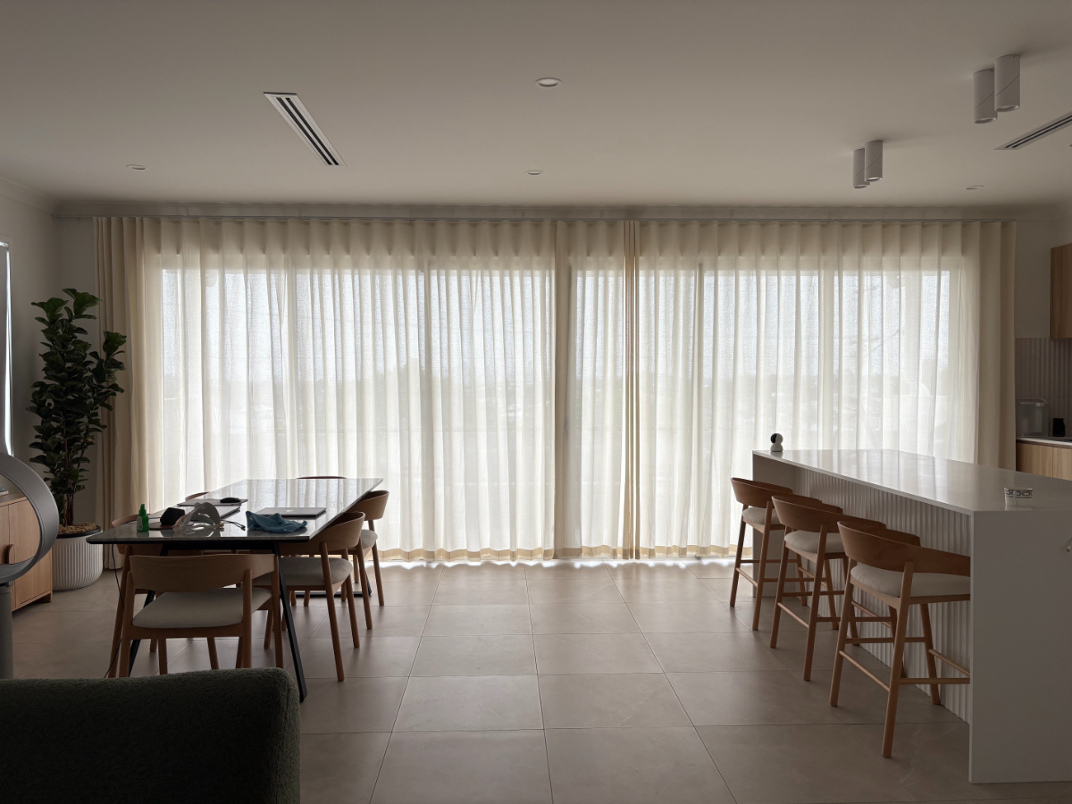 S-fold linen sheers installed for kitchen and living areas windows