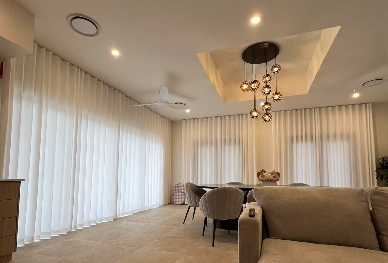 S-fold privacy sheer installed for living and dining areas windows