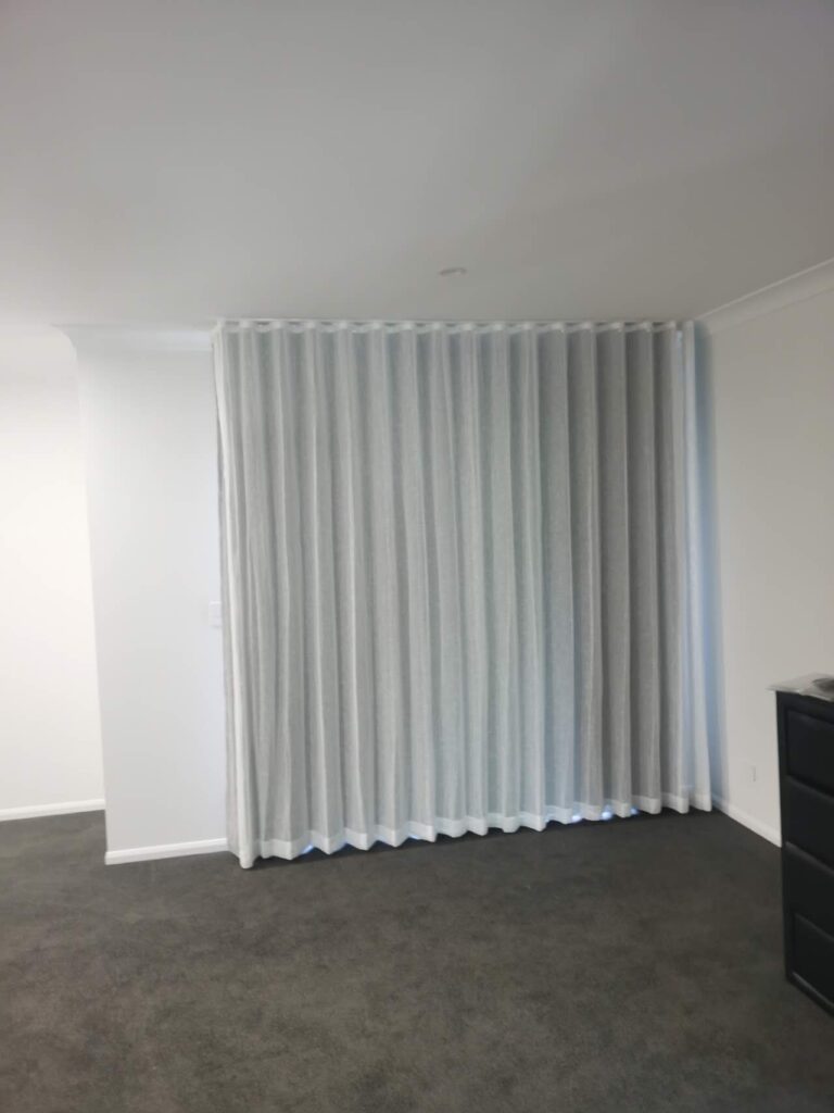 s fold sheer with pinch blockout curtain installed for one window